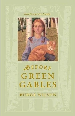 couverture verte souple montrant une fillette (avec deux tresses rousses) tenant un chat